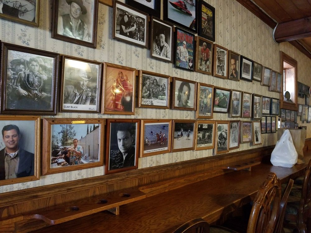 Inside the 1000 Oaks Meat Locker — celebrity photo wall and original counter